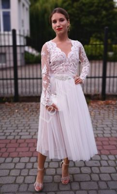 Biała oryginalna sukienka ślubna z podszewką brudno różową, rene